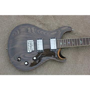 Full size electric guitar with maple venner in transparent black color