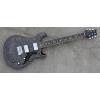 Full size electric guitar with maple venner in transparent black color